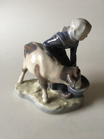 Royal Copenhagen Figurine Girl with Calf No 779