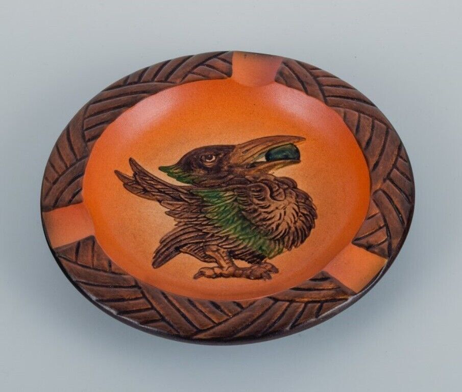 Ipsen's Denmark Bowl with bird and glaze in shades of orange-green