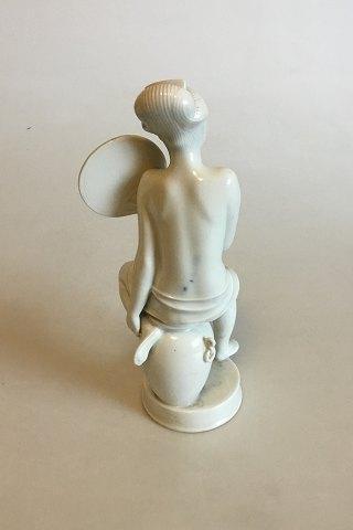 Royal Copenhagen Figurine of  Woman with fan No 12486