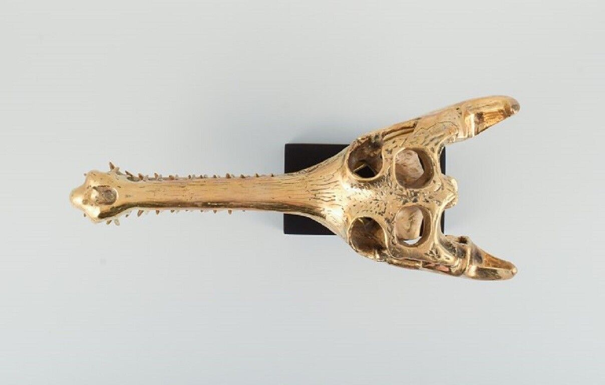 Large sculpture in gilded metal Modern design in the shape of crocodile skull