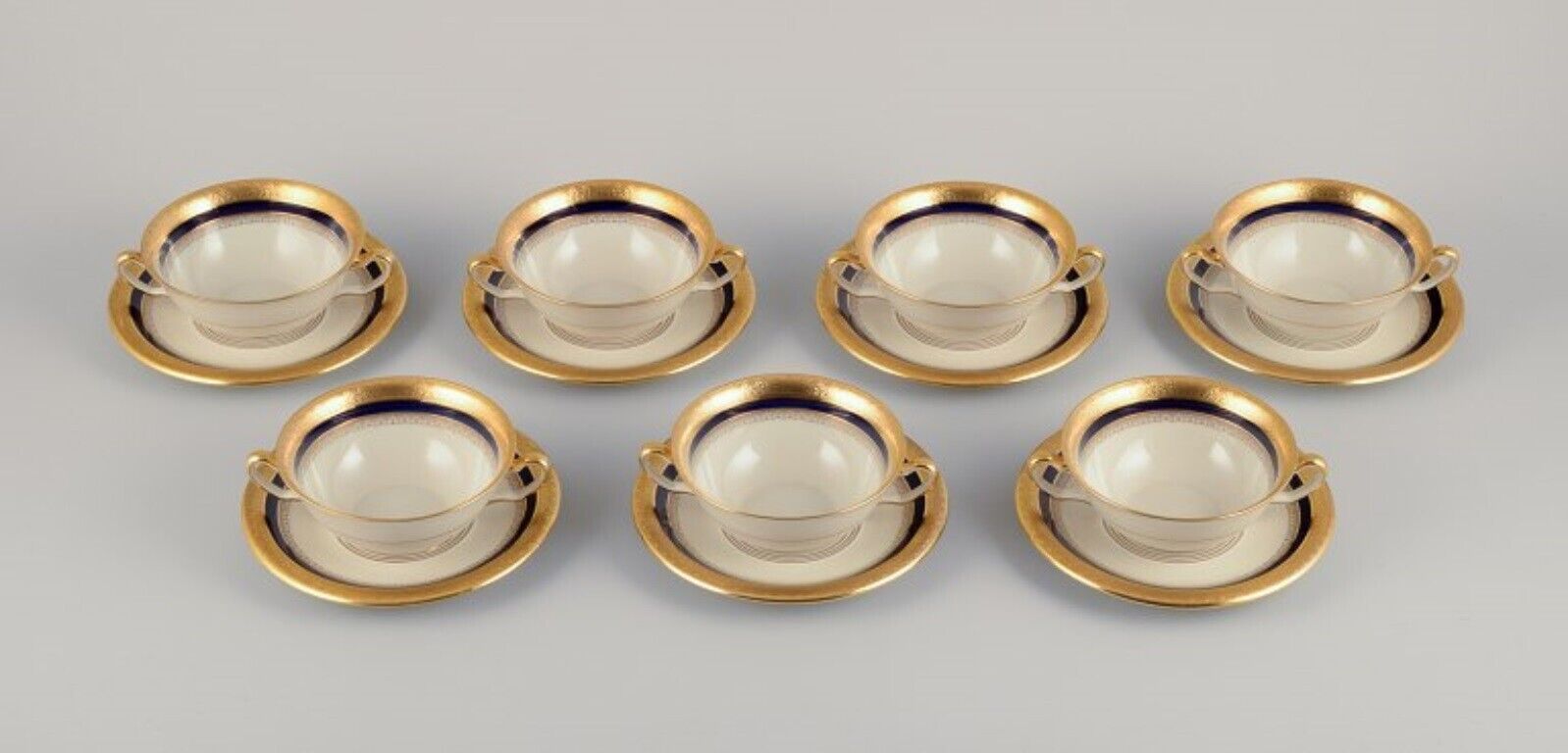 Hutschenreuther Germany Seven bouillon cups and saucers in porcelain