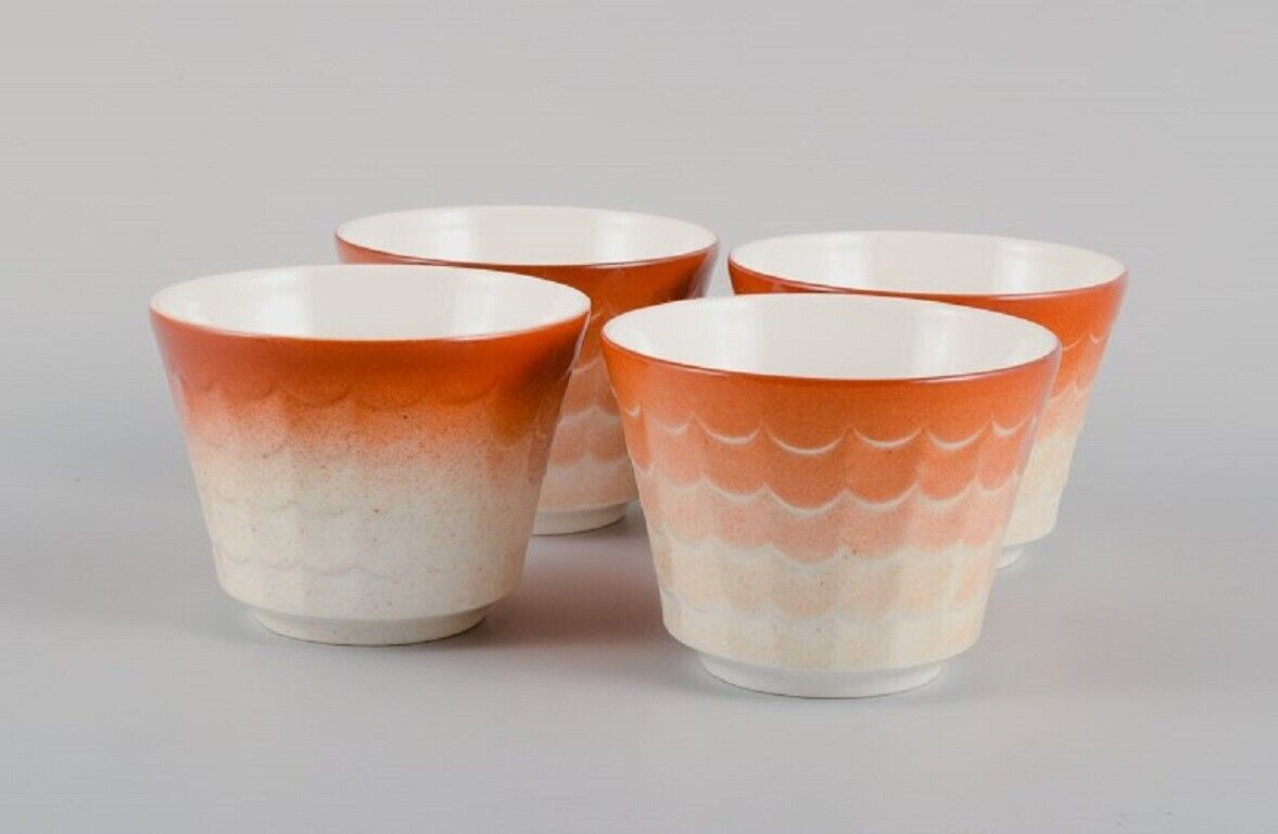 Wilhelm Kåge for Gustavsberg Four flower pot covers in porcelain