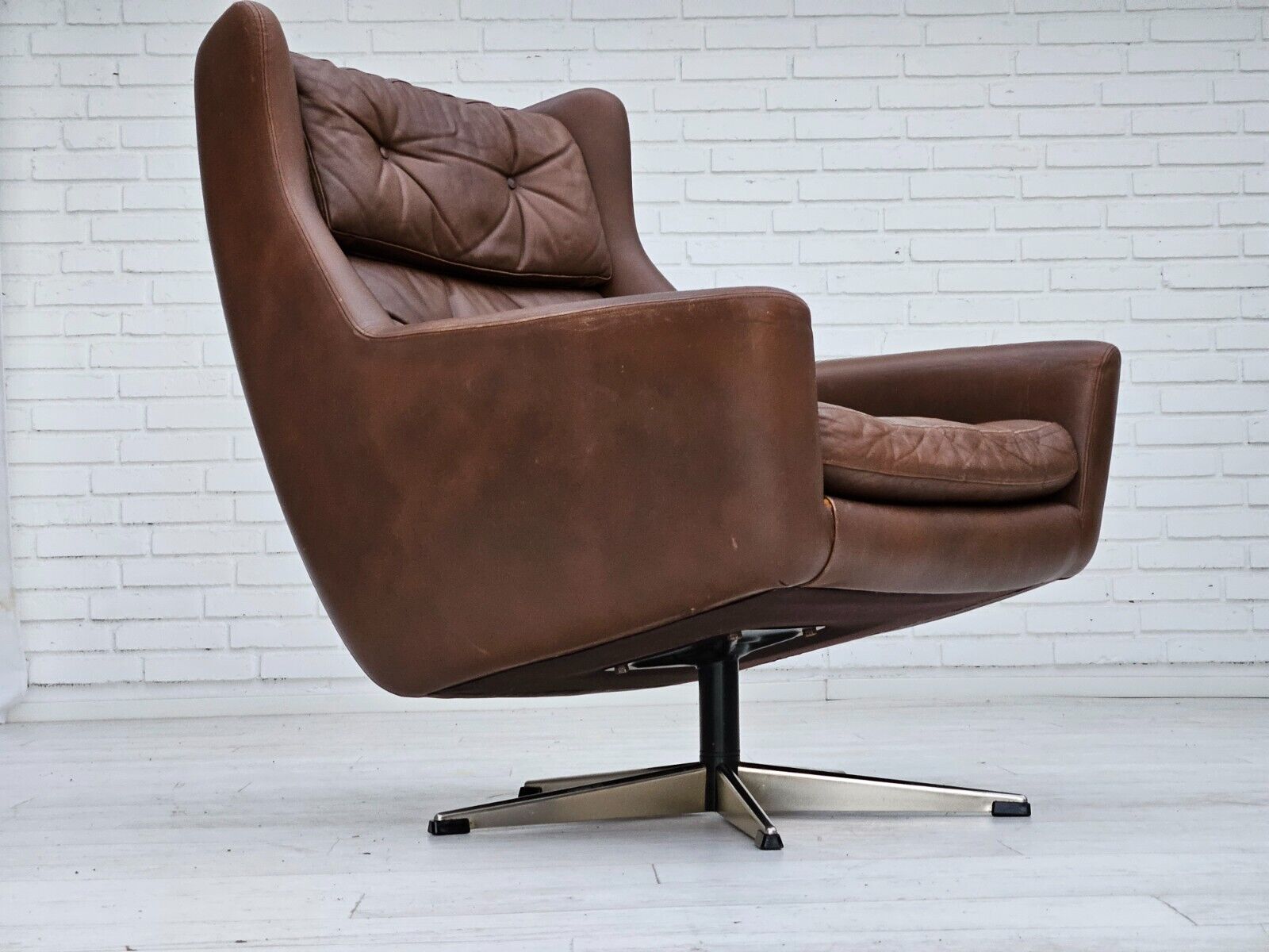 1970s Danish swivel chair with footstool original good condition leather