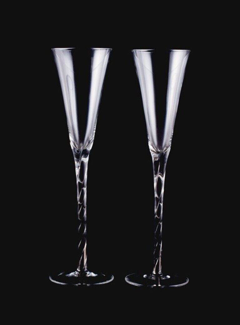 Danish glass artist two champagne flutes in art glass with silver inlays