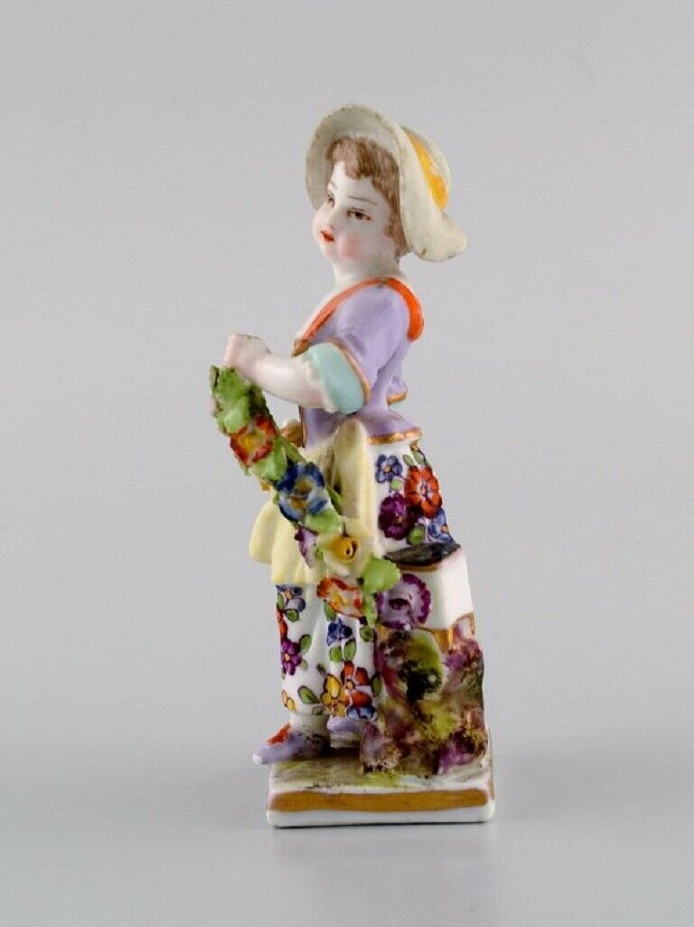 Augustus Rex Germany Antique hand-painted porcelain figure Girl with flowers