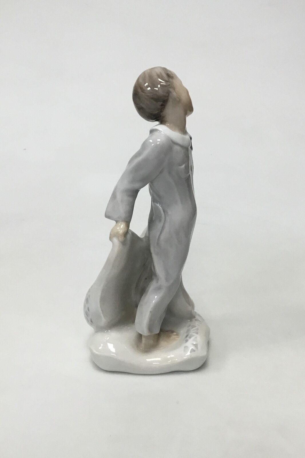 Royal Copenhagen Figurine of Boy with pillows No 2604