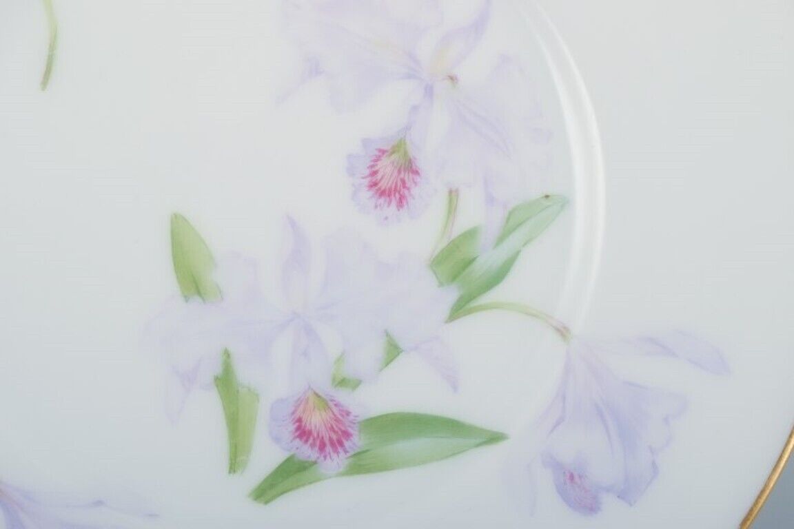 Royal Copenhagen five porcelain Art Nouveau plates with lilies and gold trim