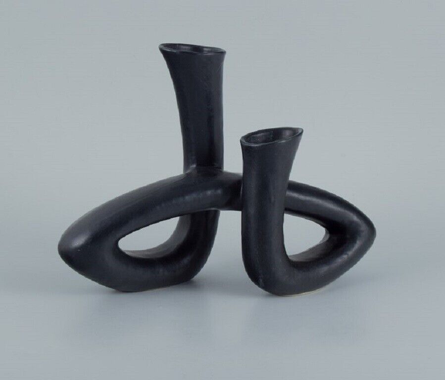 European studio ceramicist Unique twisted vase in black glaze