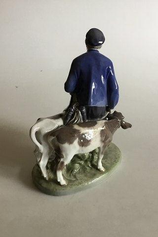 Royal Copenhagen Figurine Boy with Calfs No 1858