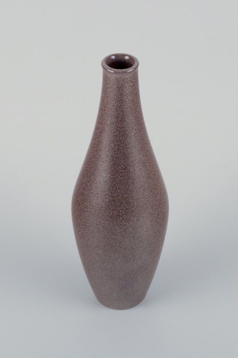 European studio ceramicist ceramic vase with speckled glaze in brown tones