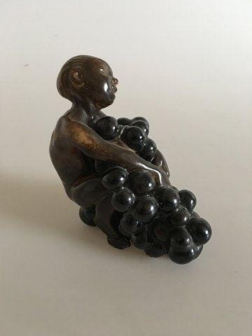 Bing and Grondahl Stoneware figurine Boy with grapes by Kai Nielsen