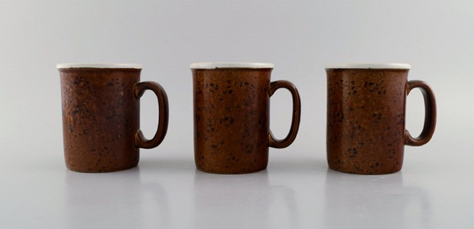 Stig Lindberg for Gustavsberg Five large Coq mugs in glazed stoneware