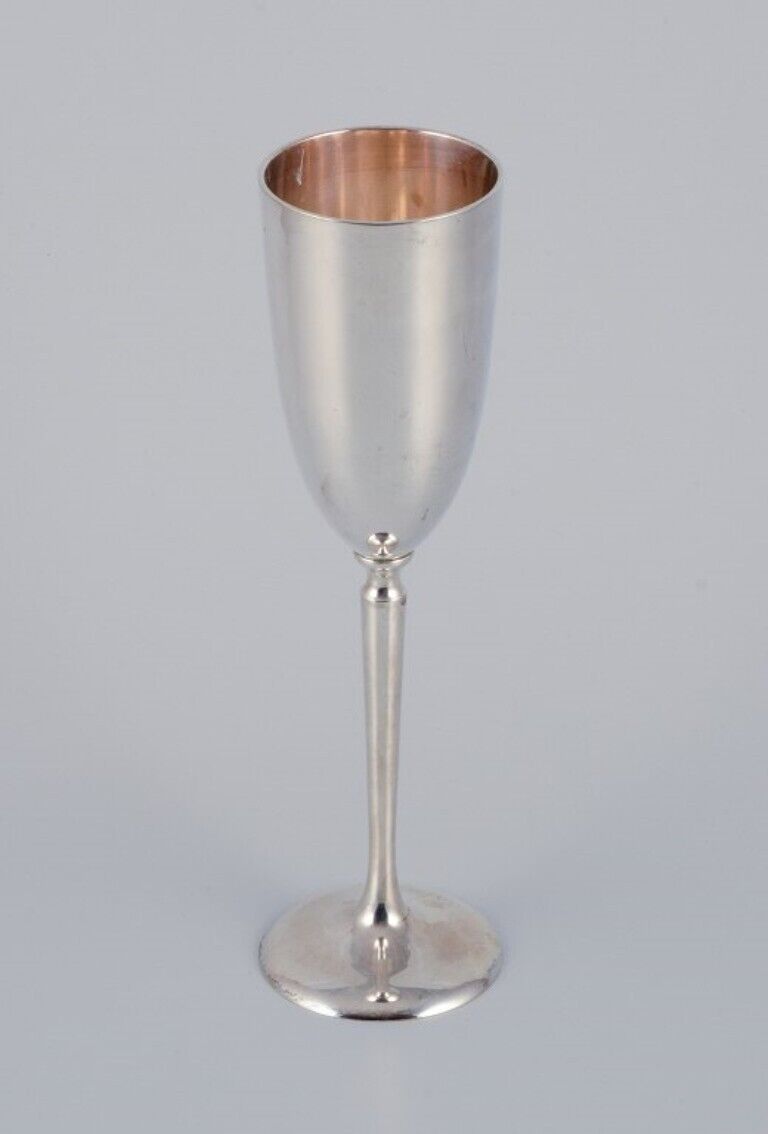 Gunilla Lindahl Scandia PresentTwo large champagne flutes in plated silver