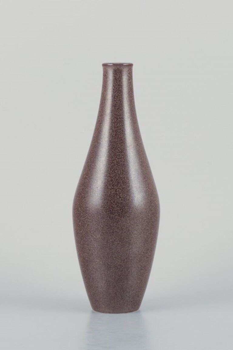 European studio ceramicist ceramic vase with speckled glaze in brown tones