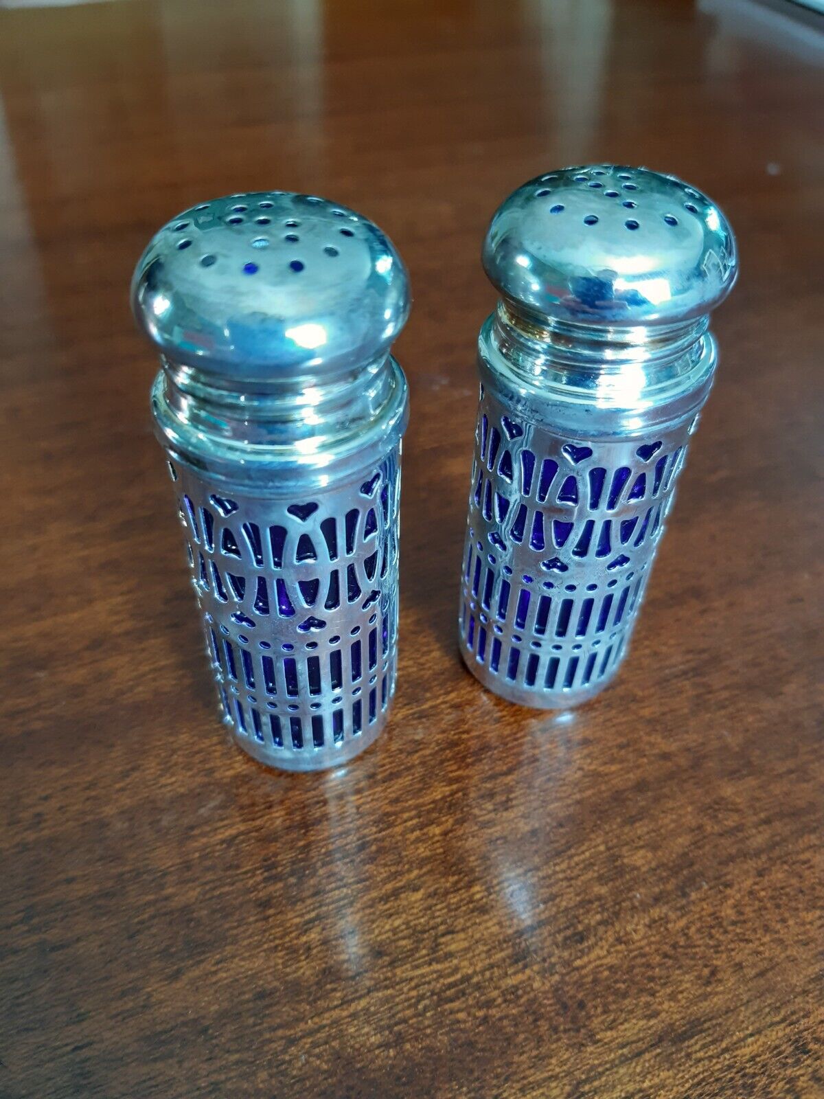 Salt and pepper metal and cobalt blue glass shaker