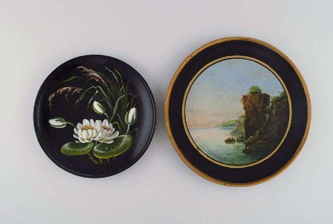 Two antique Hjorth decorative plates in hand-painted teracotta Late 19th C