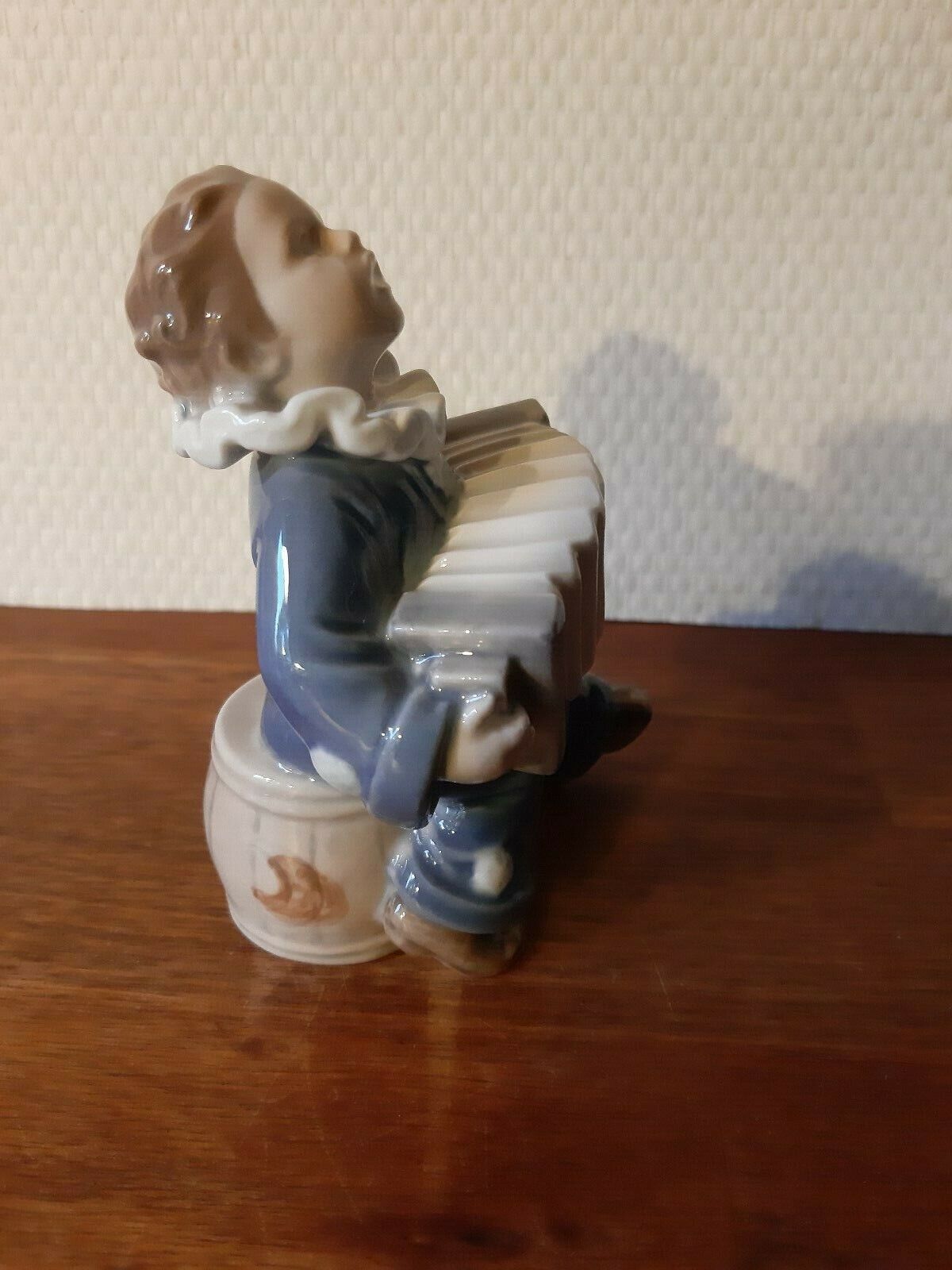 CHILD with ACCORDION # 3667 by Ada Bonfils for ROYAL COPENHAGEN Fact 1st