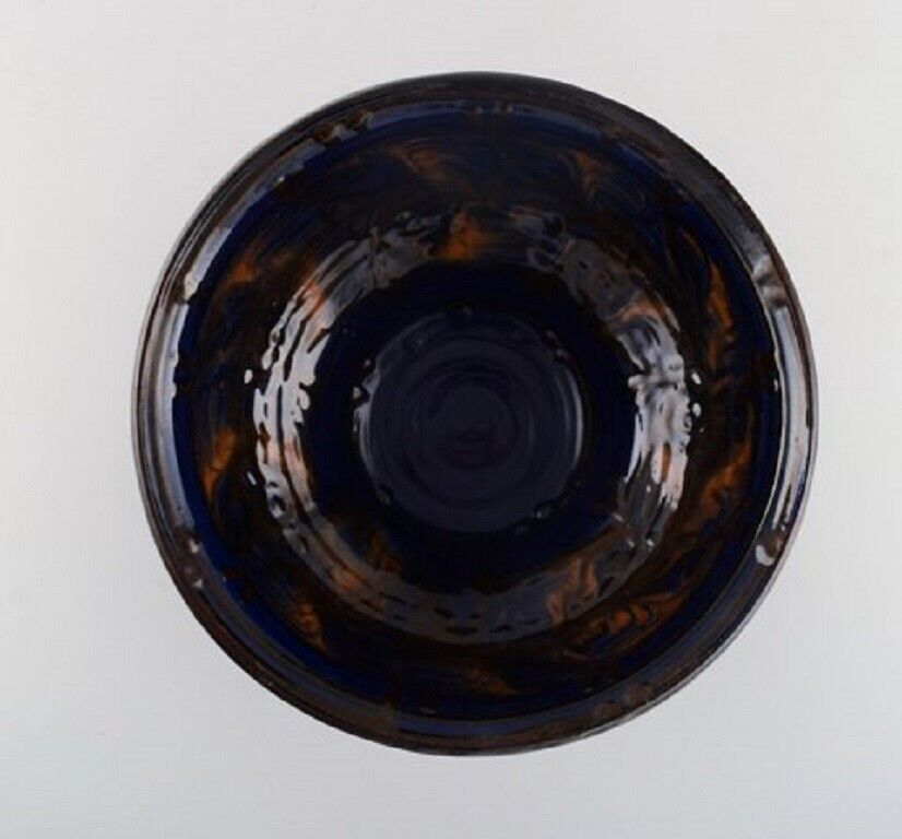 Kähler Denmark Bowl in glazed stoneware Orange foliage on blue background