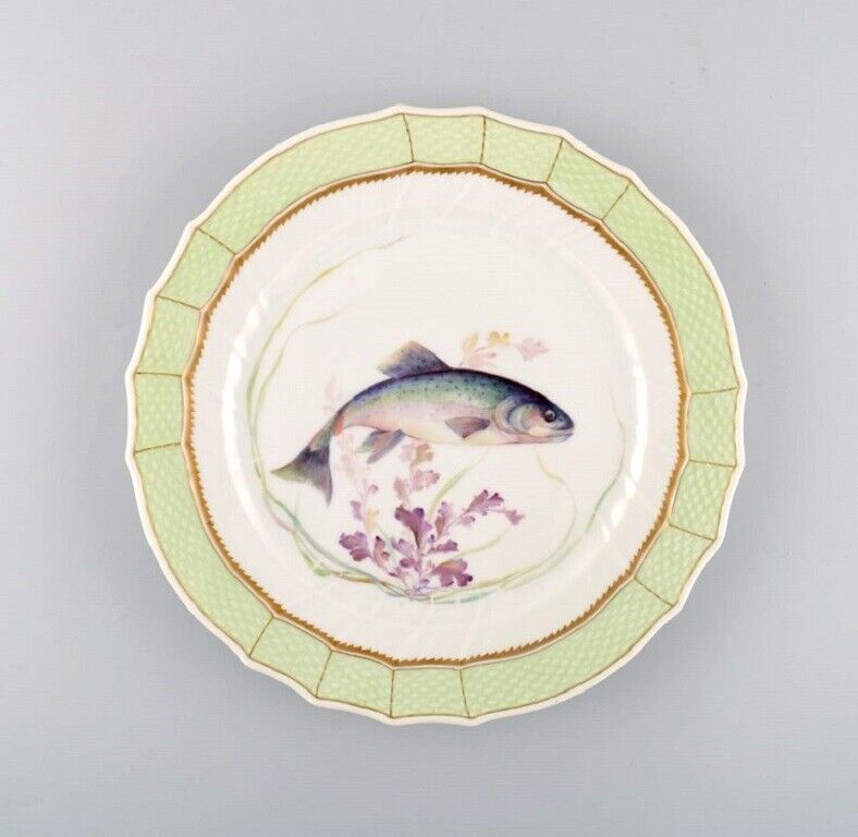 Royal Copenhagen fish plate with green edge gold decoration and fish motif