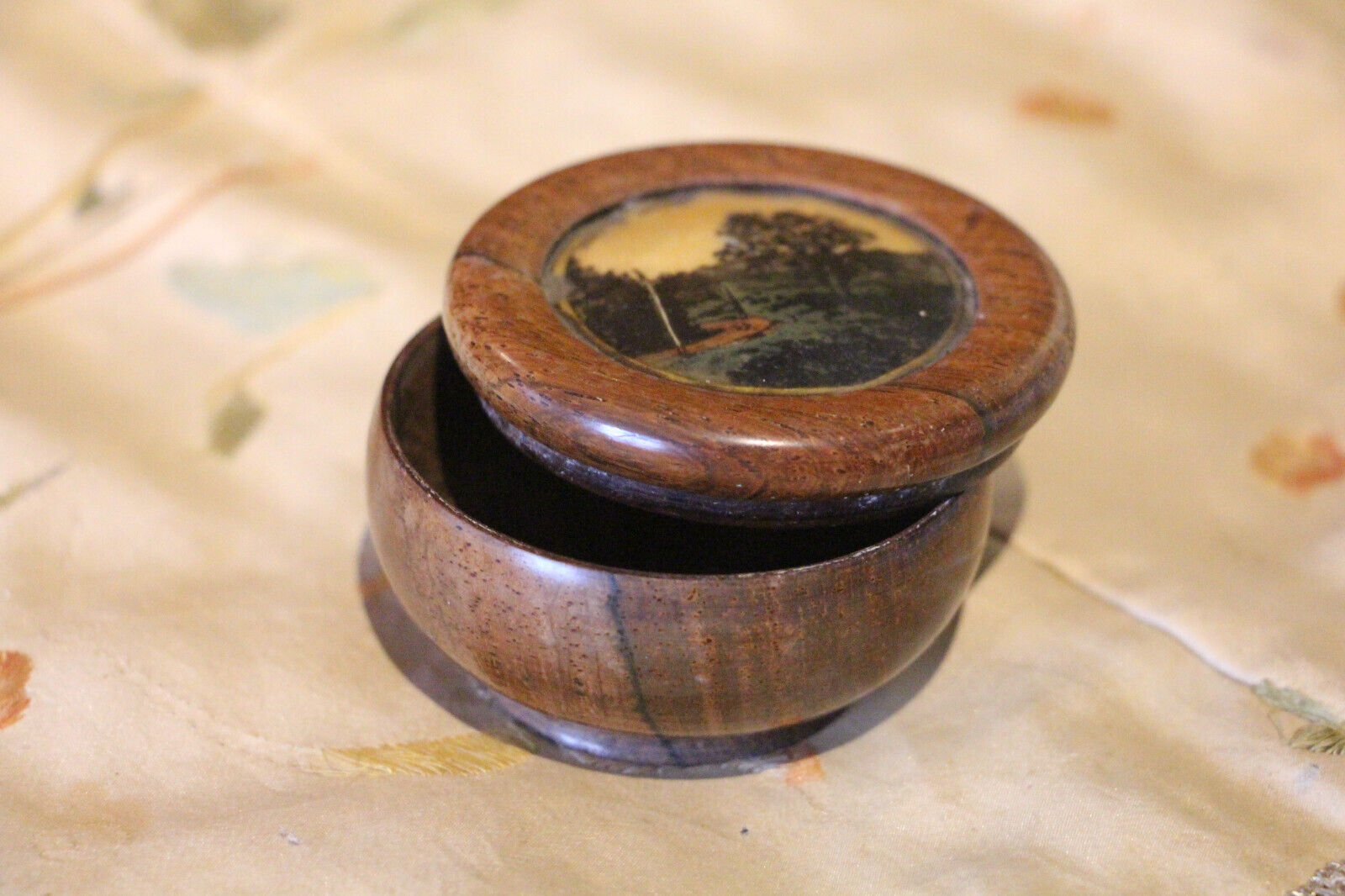 Small round wooden pill-box