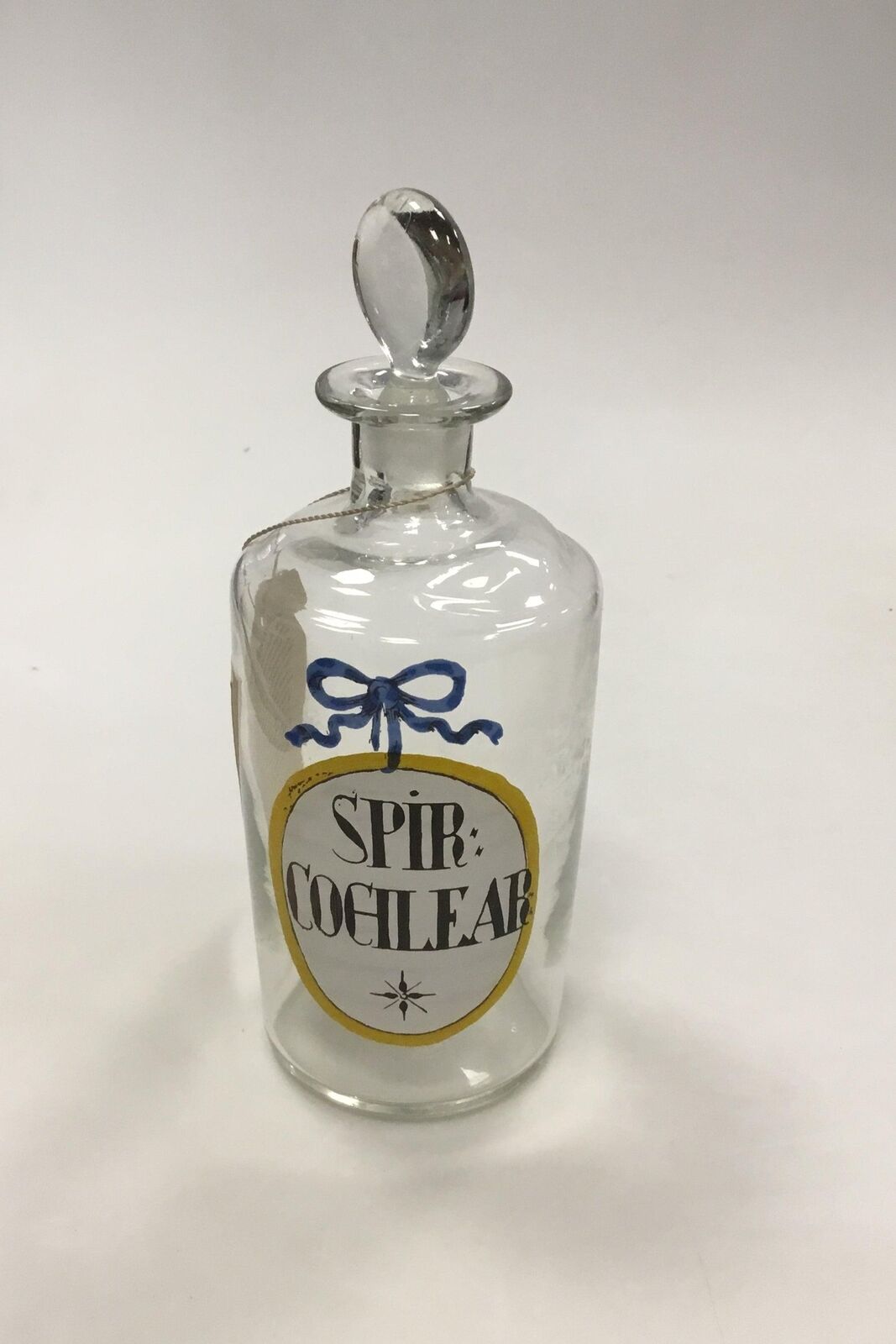 Holmegaard pharmacy jar with text SPIR COCHLEAR from 1981