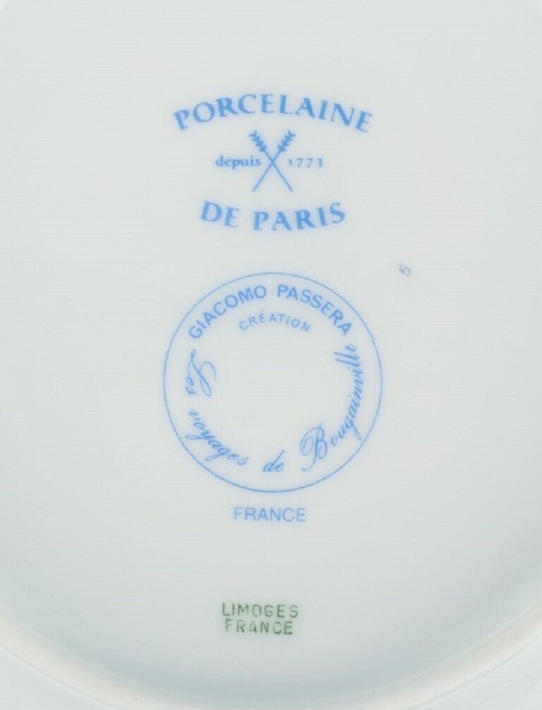 Giacomo Passera for Porcelaine de Paris A set of four plates