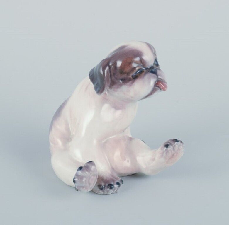 Dahl Jensen porcelain figurine of a Pekingese puppy  Ca 1930