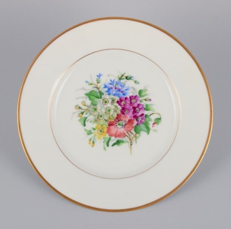 Bing  Grøndahl Denmark Set of five porcelain plates hand-painted with flowers