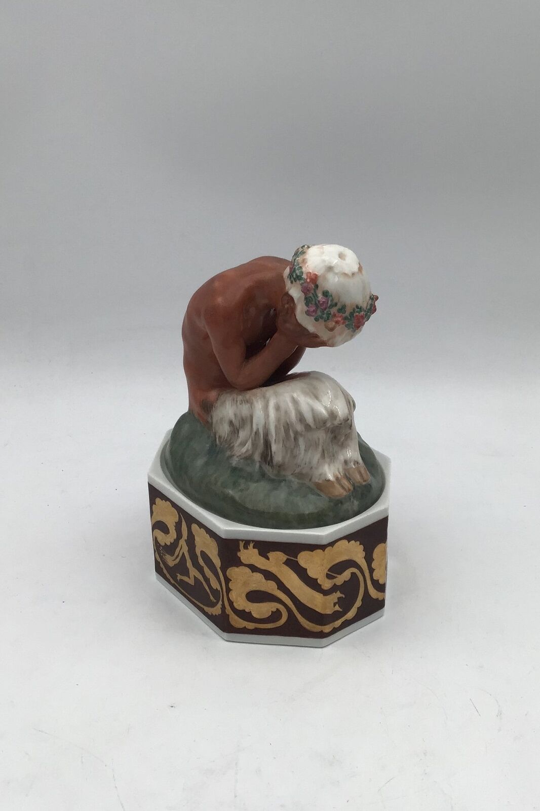 Royal Copenhagen Gerhard Henning Overglaze figurine Crying Faun on stand No