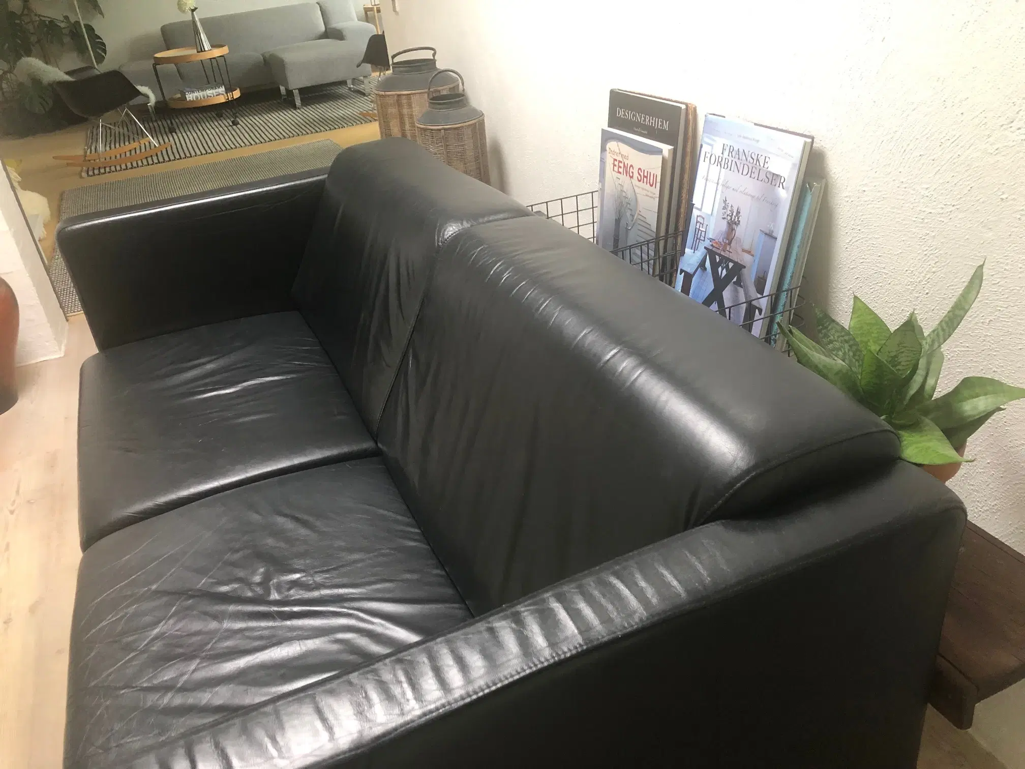 2 sofaer i sort læder - med patina