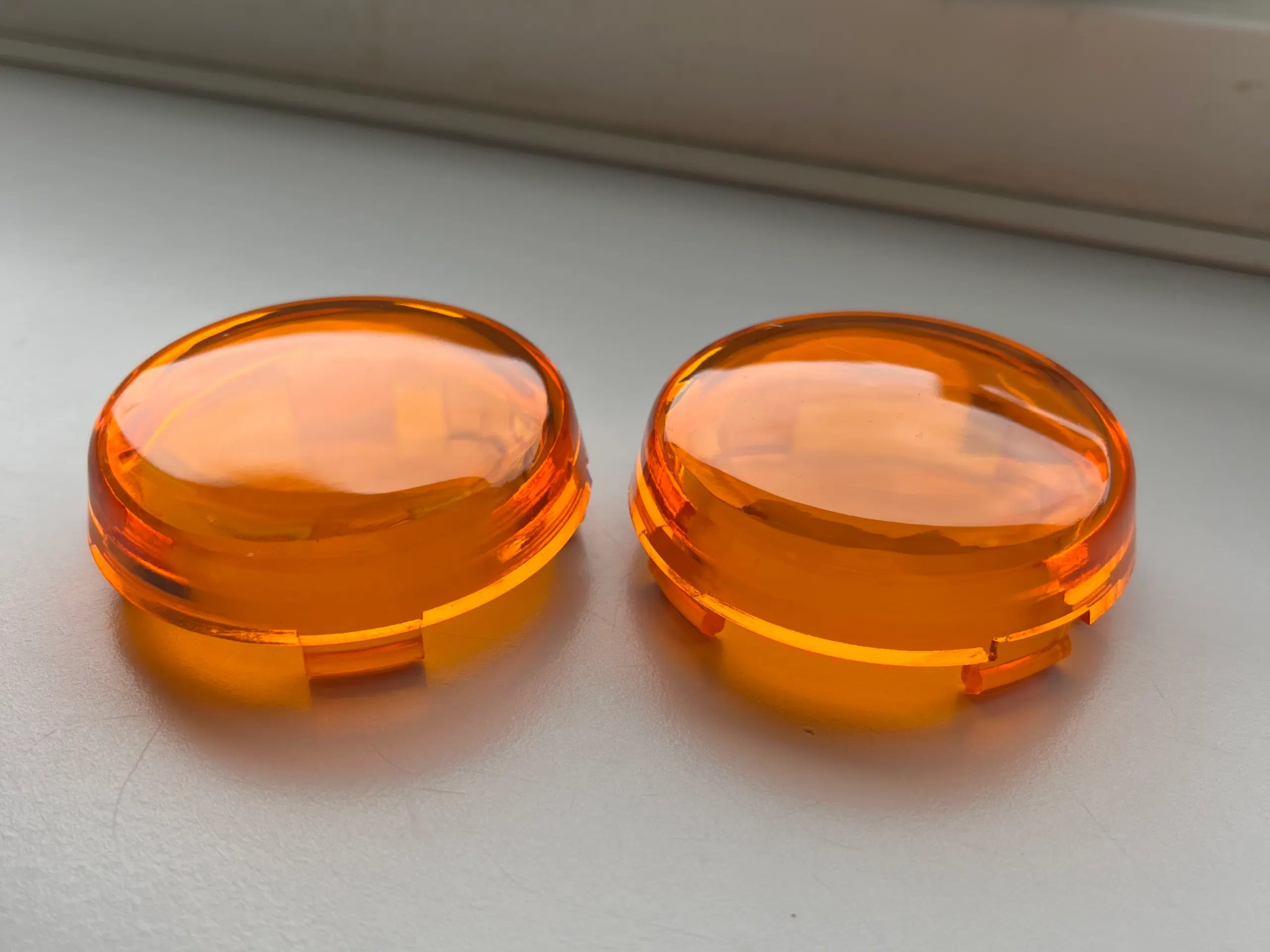 Små orange blinklysglas til Harley