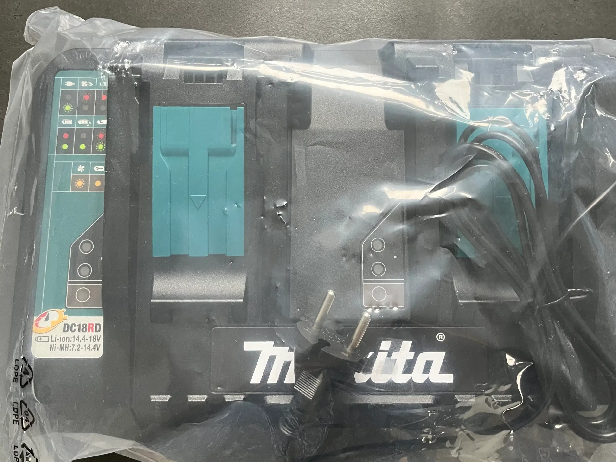 Ubrugt Makita dobbelt batterilader