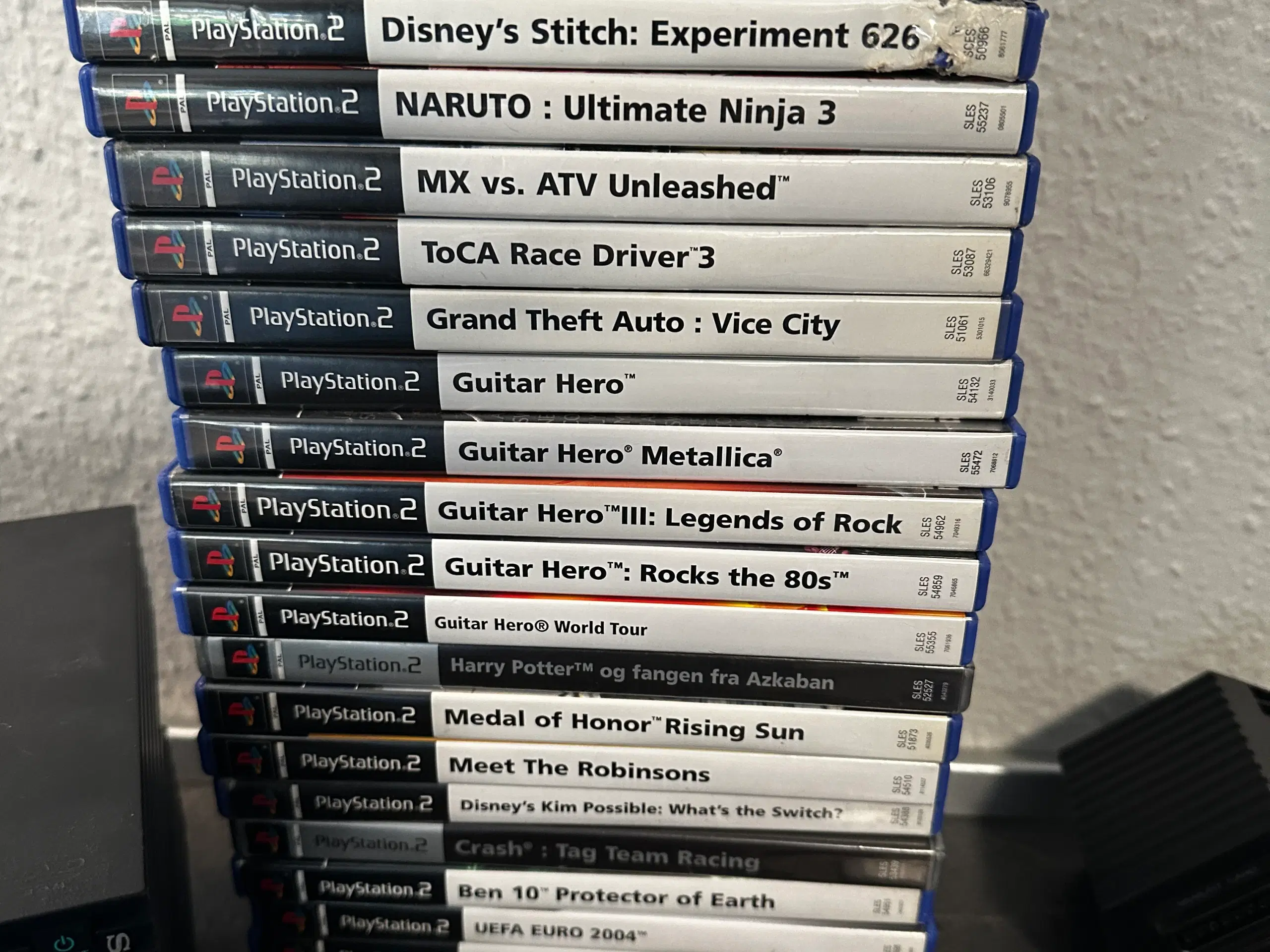 Playstation 2 pakke med 2 maskiner og 27 spil