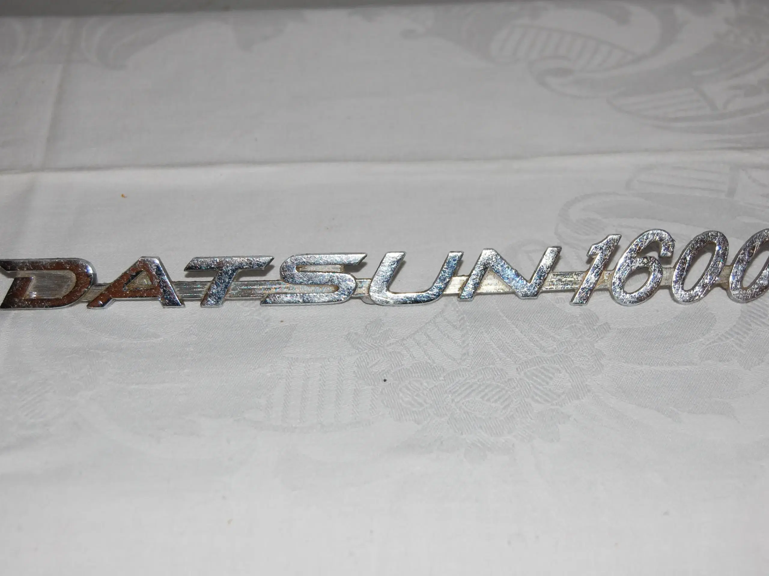 Emblem til Datsun veteran