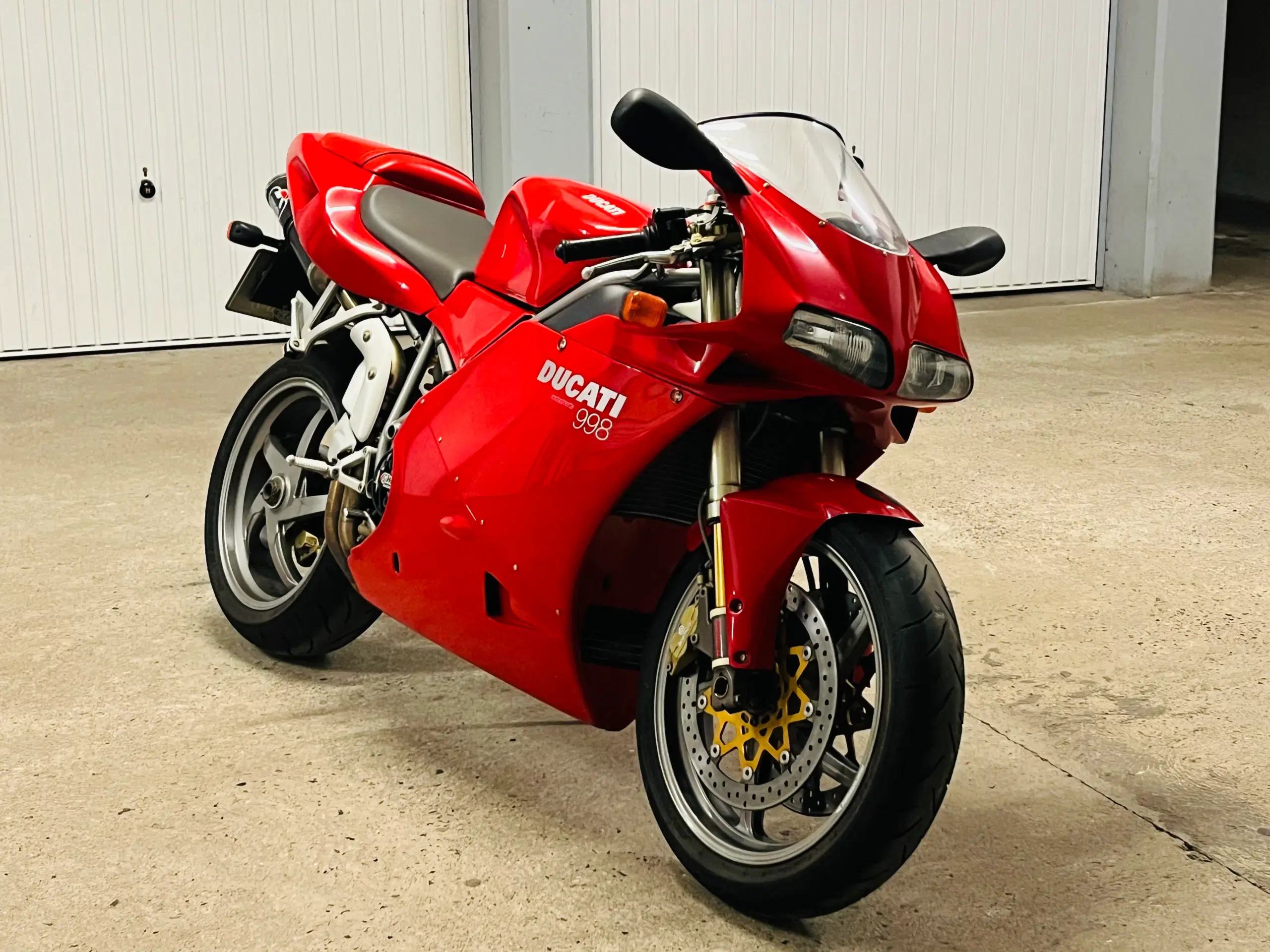 Evt. byt. med Tesla.  Ducati 998 Testastretta