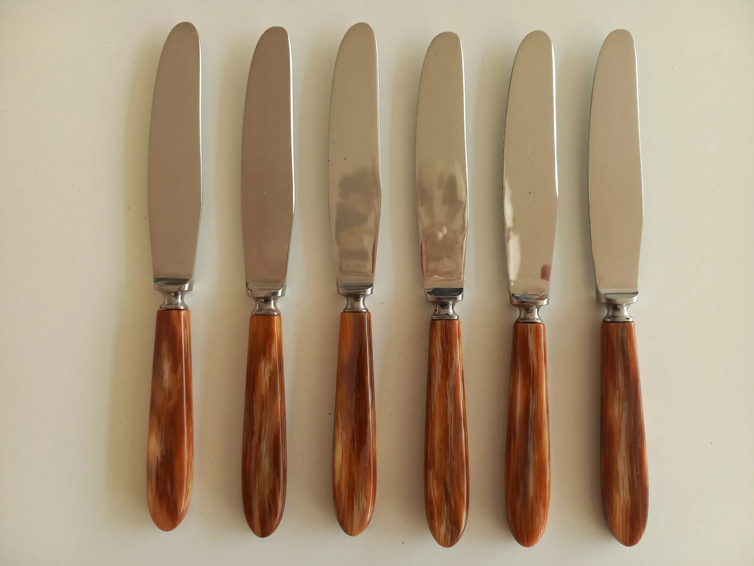 Raadvad bestik knive og gafler med brunt skaft
