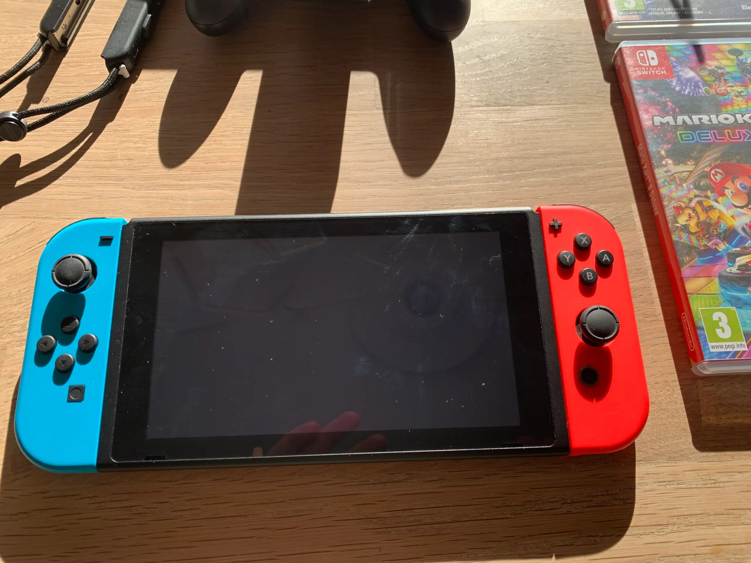 Nintendo Switch i sublim god stand og med 4 spil