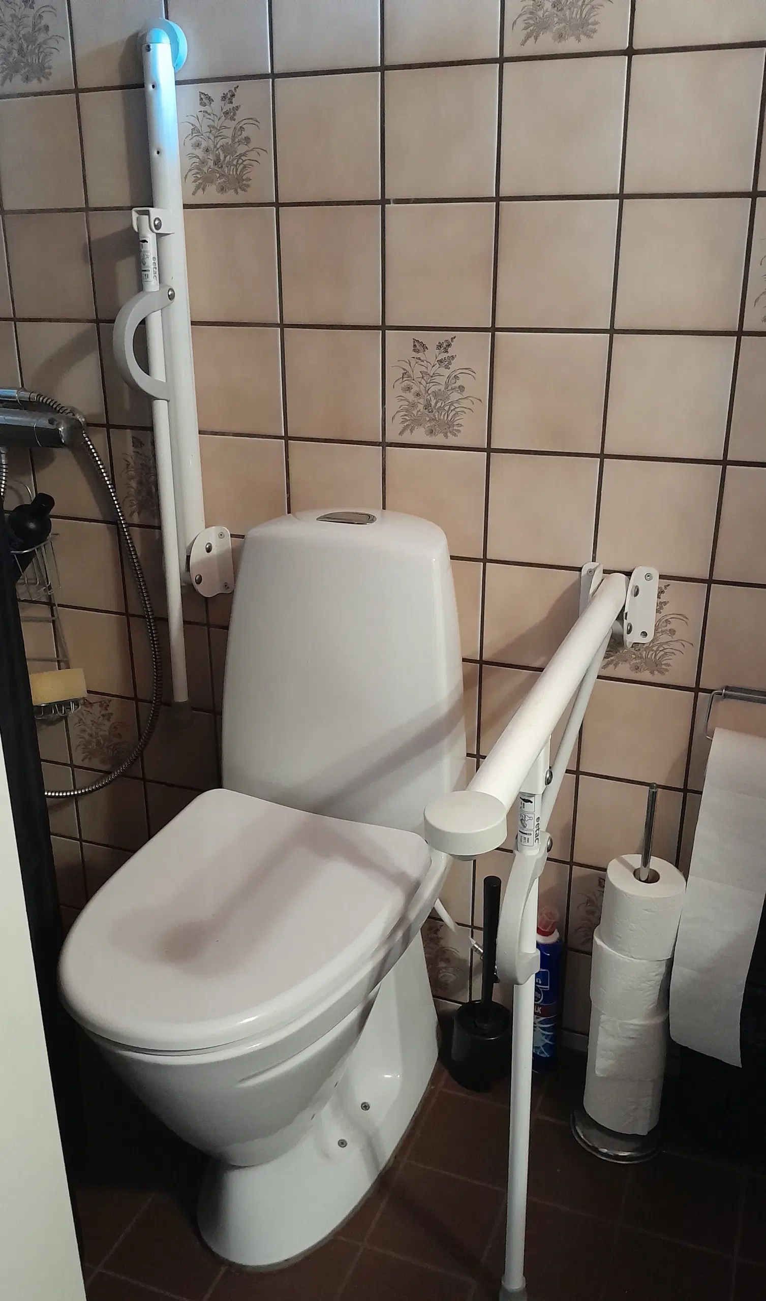 Toilet arm støtte