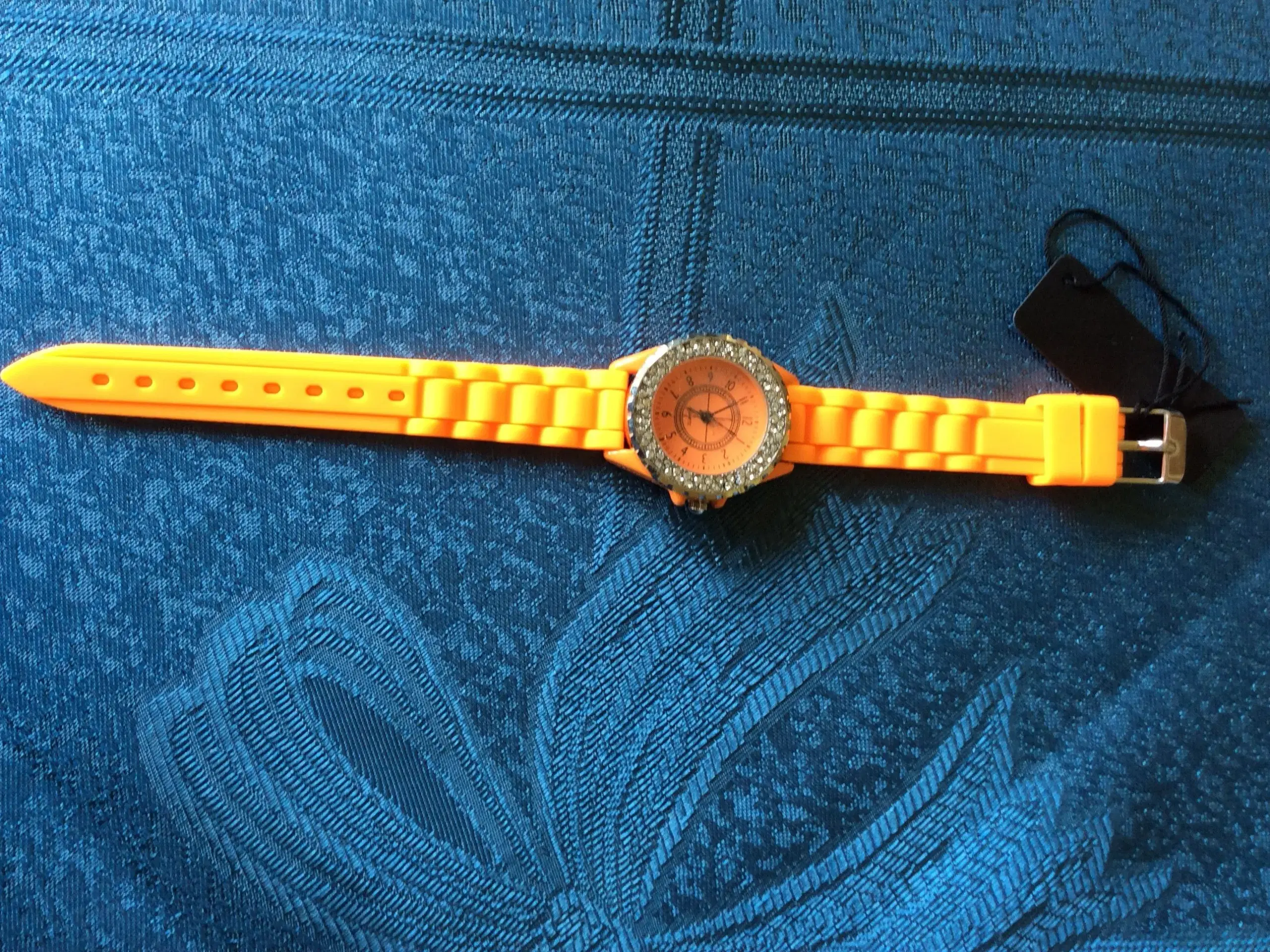 Orange armbåndsur