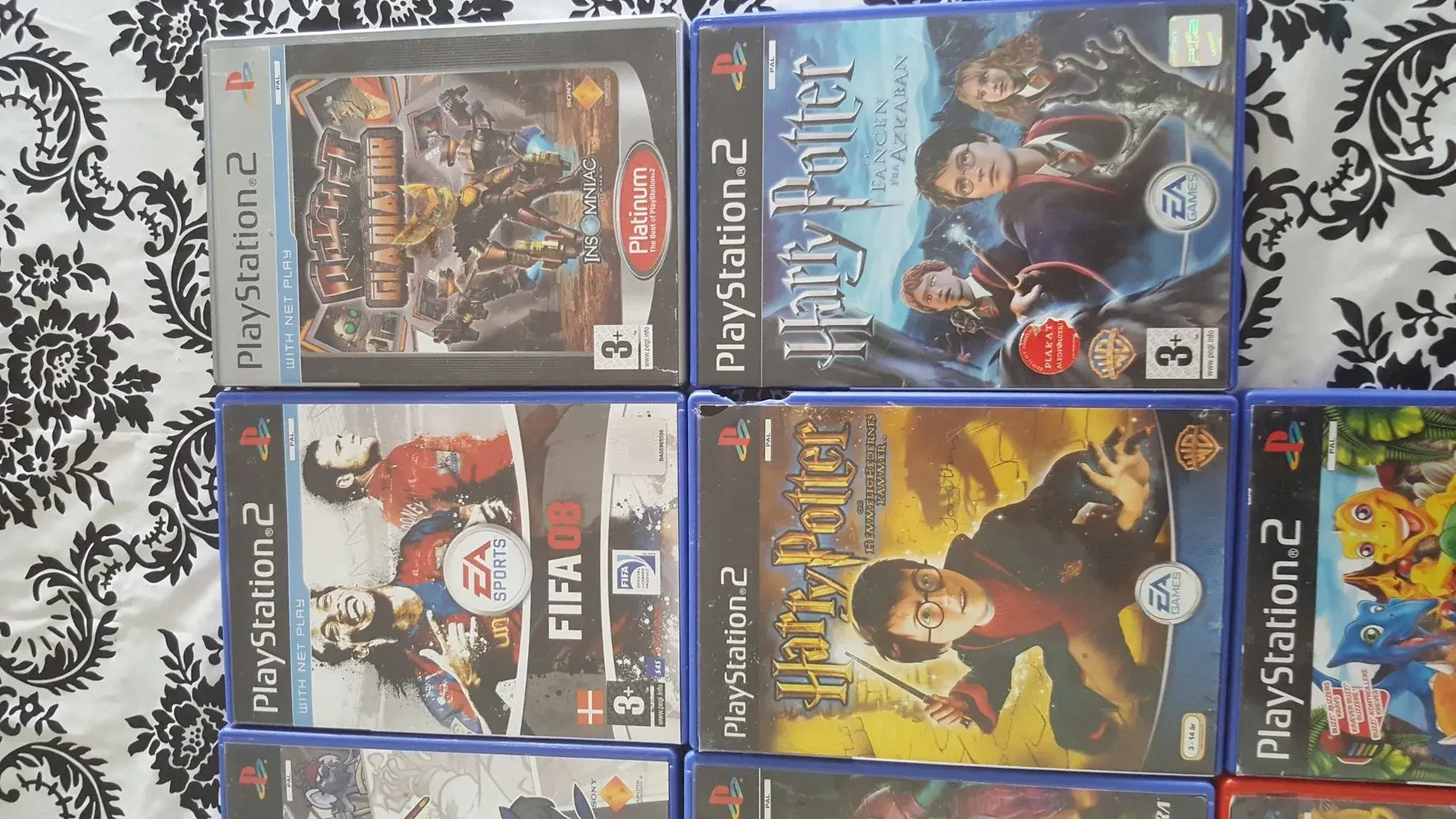 12 seje ps2 spil og 1 ps3 spil