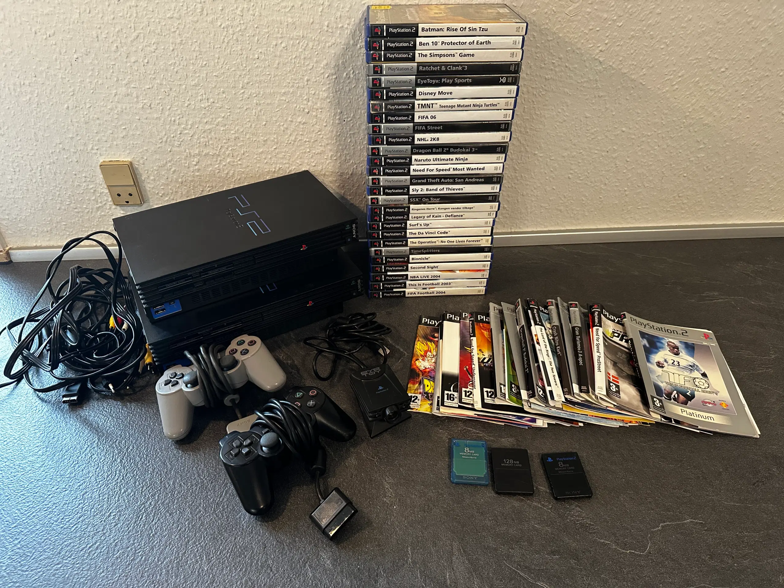 Playstation 2 pakke med 2 maskiner og 27 spil