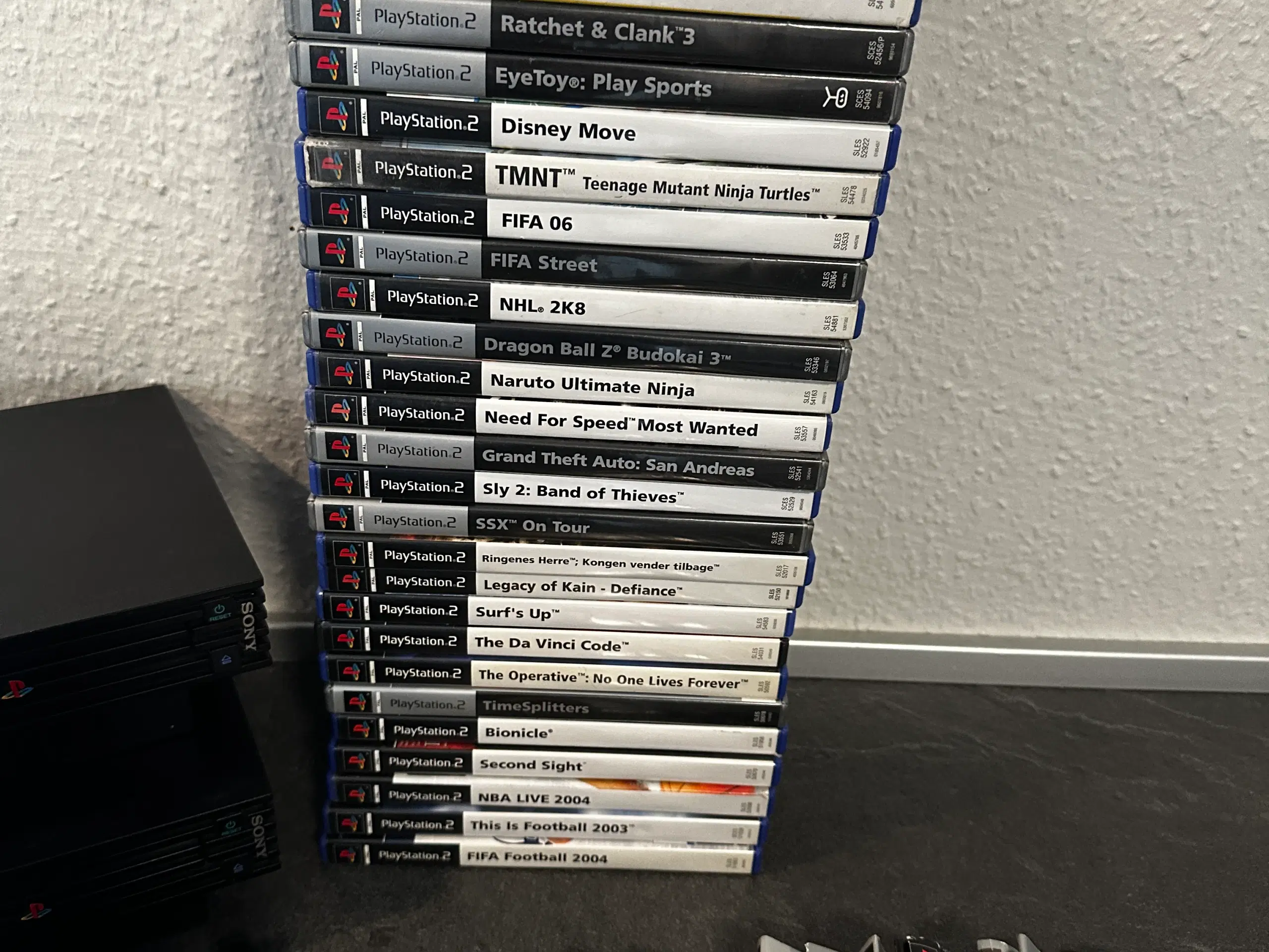 Playstation 2 pakke med 2 maskiner og 27 spil