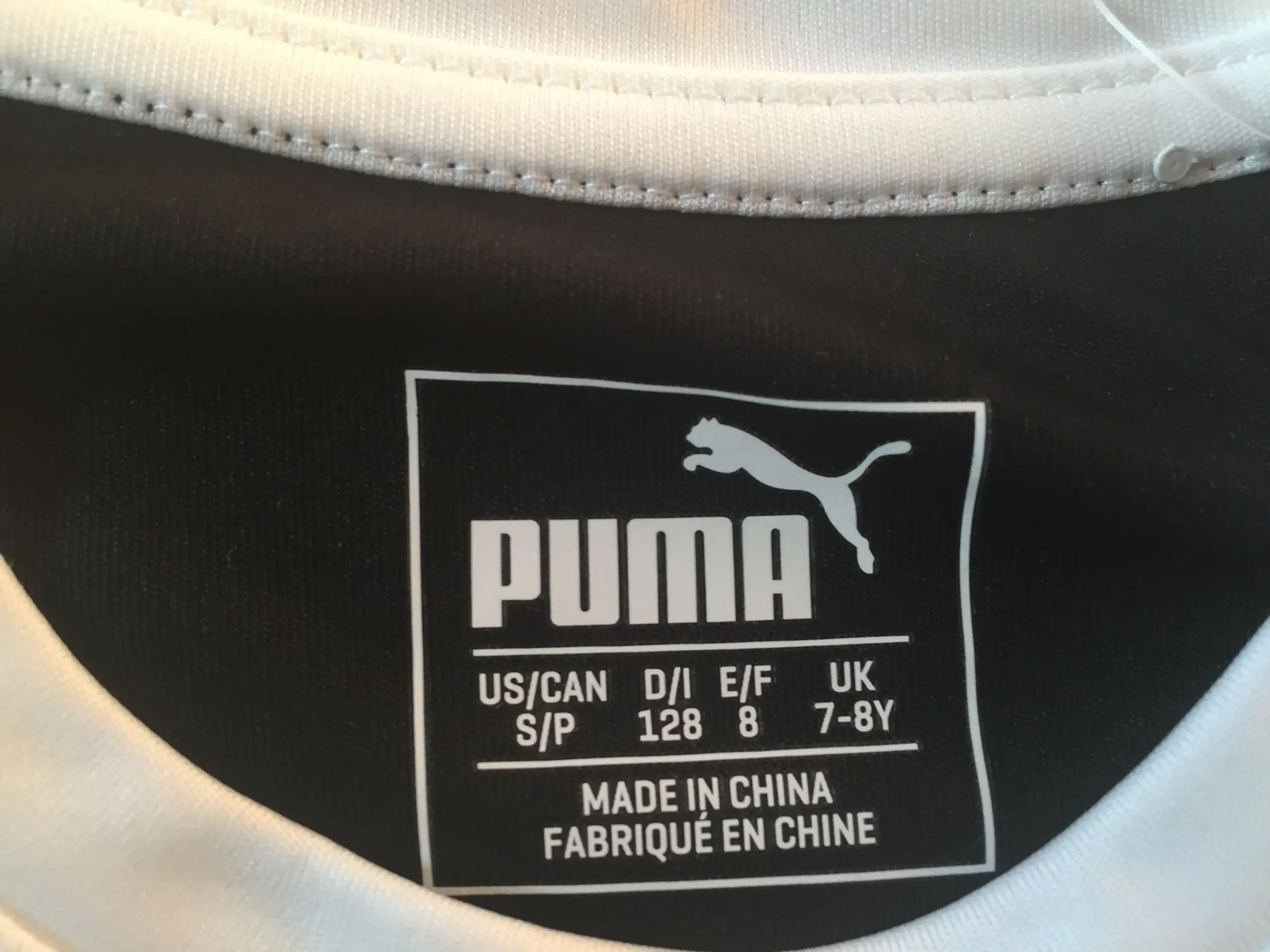 NY stribet Puma t-shirt (7-8 år)