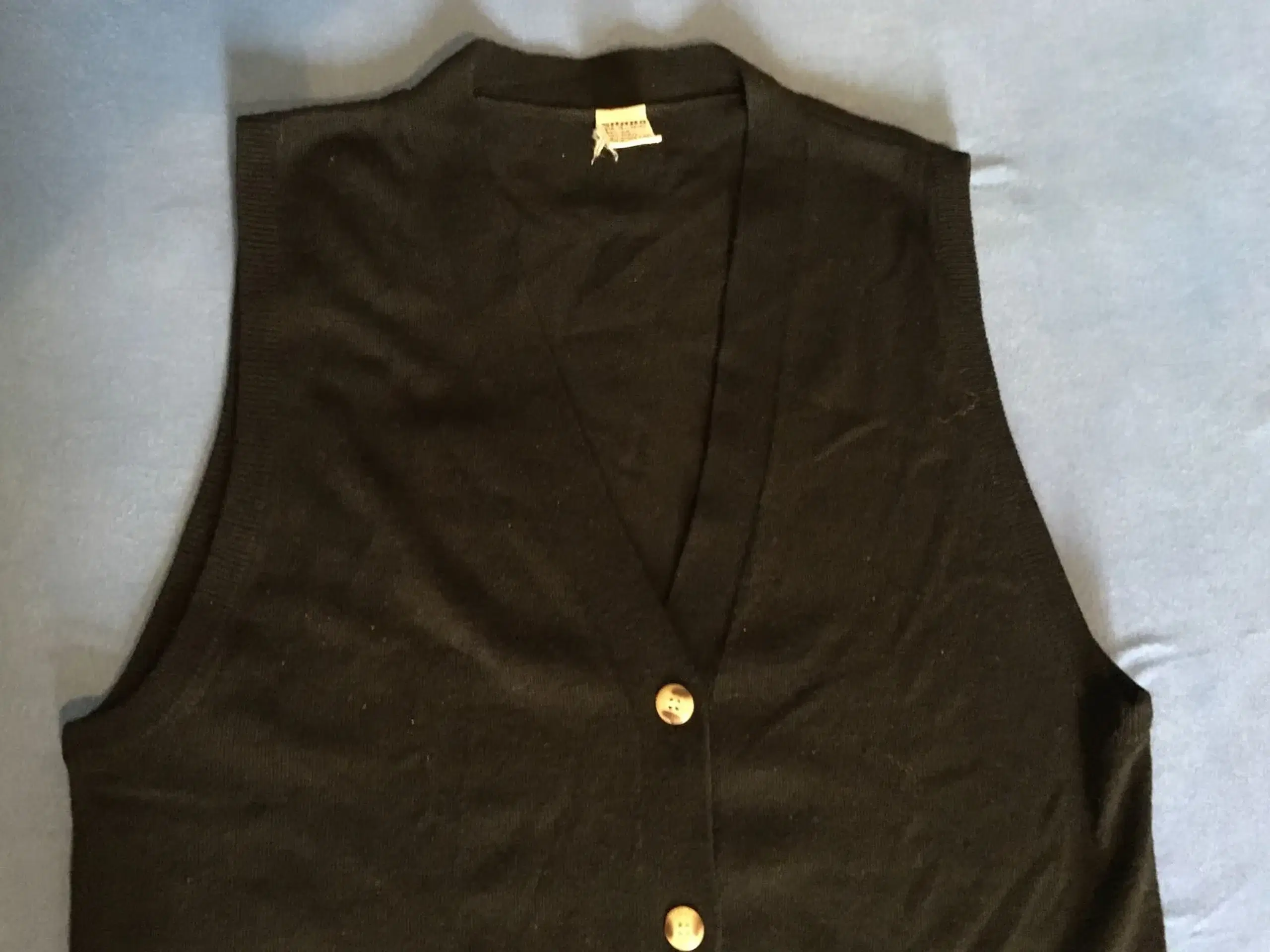 Lang sort vest