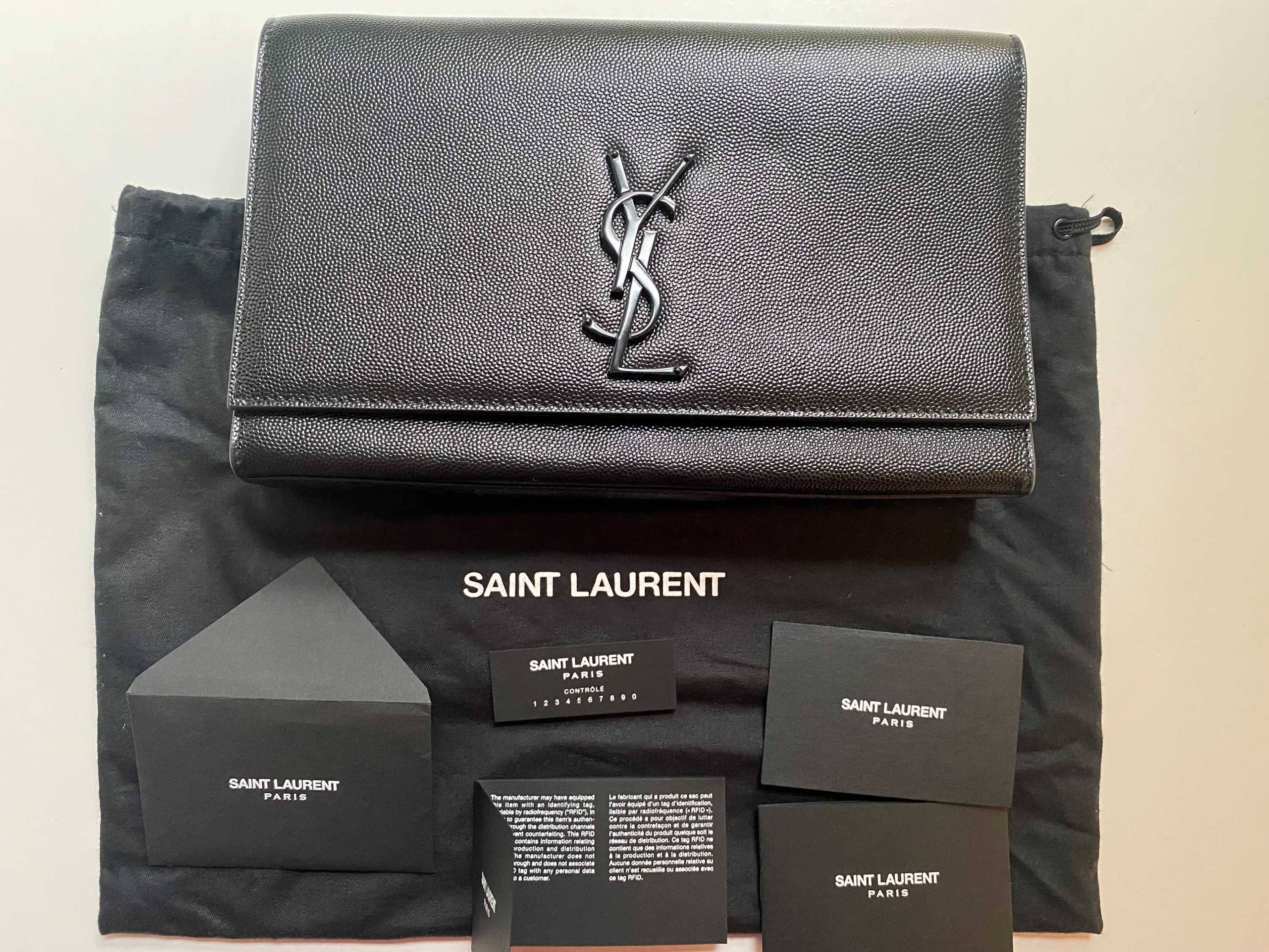 Preowned Saint Laurent Grain De Poudre Medium Kate Bag Black with black metal work leather