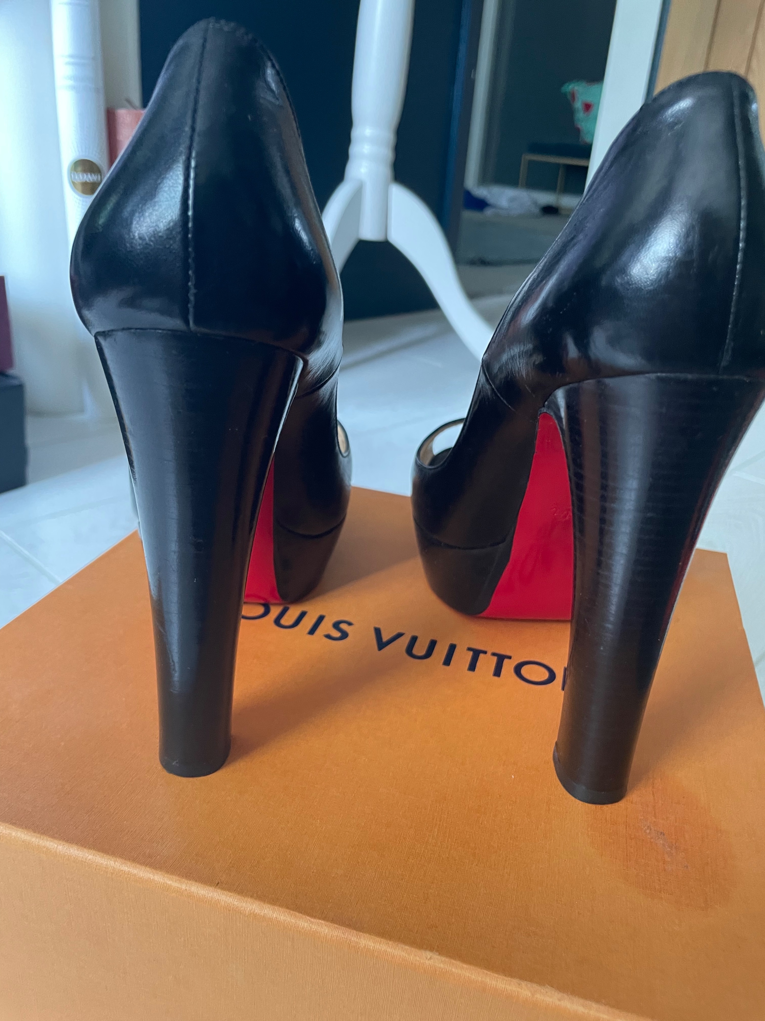 Preowned Christian Louboutin Black leather peep-toe platform heeled pumps Size 375