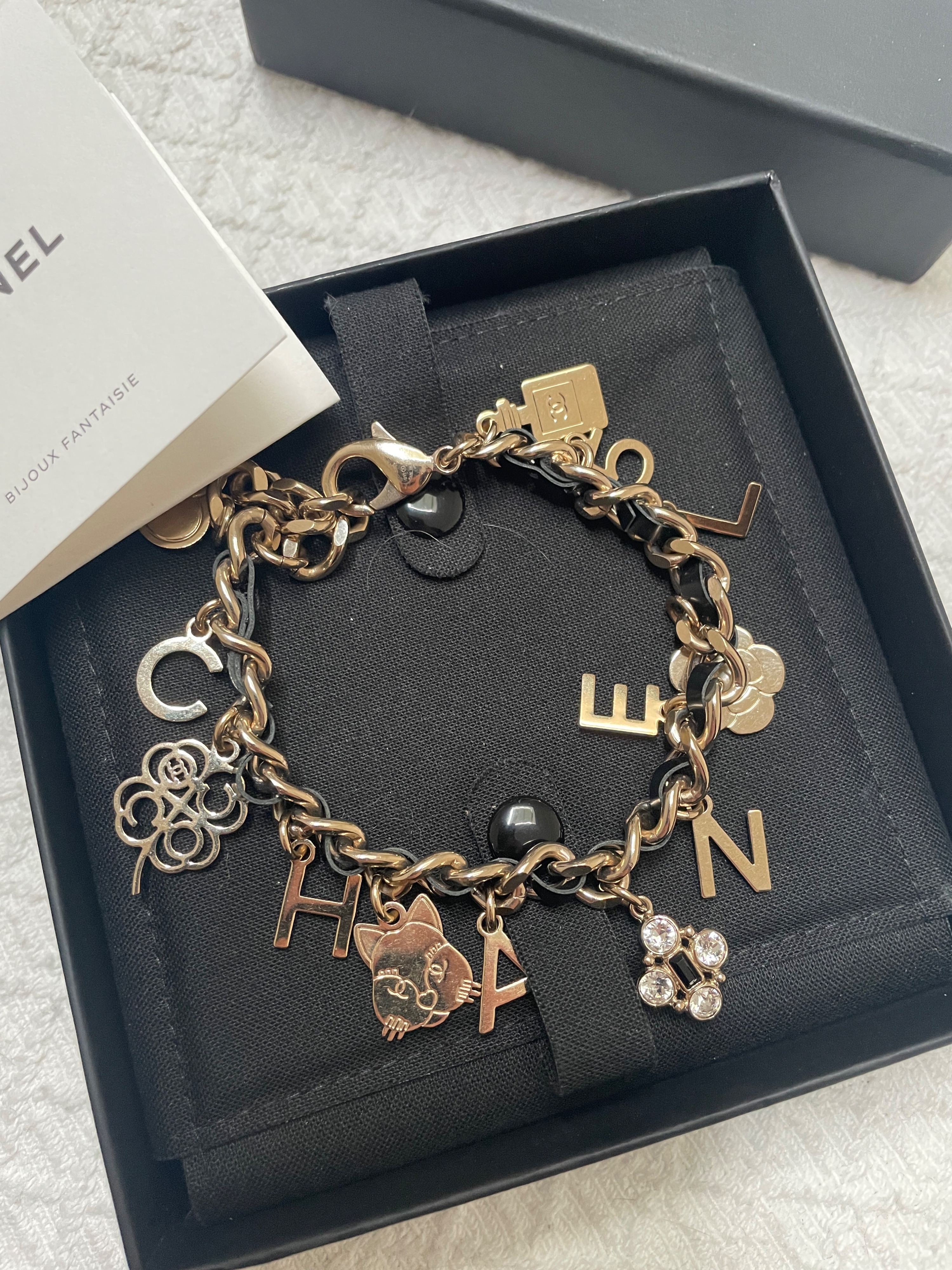 Chanel Black  Gold Charm Bracelet