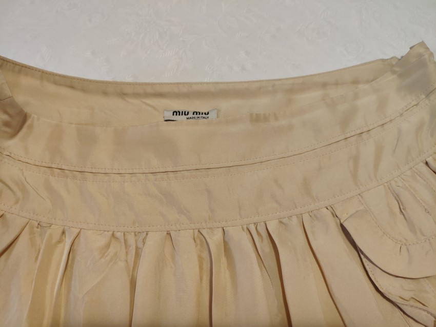 Miu Miu beige pleated mini skirt Size M Beige/Nude