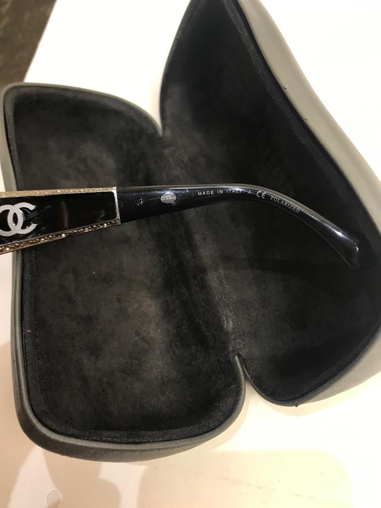 Preowned Chanel Black acetate embellished arm sunglasses