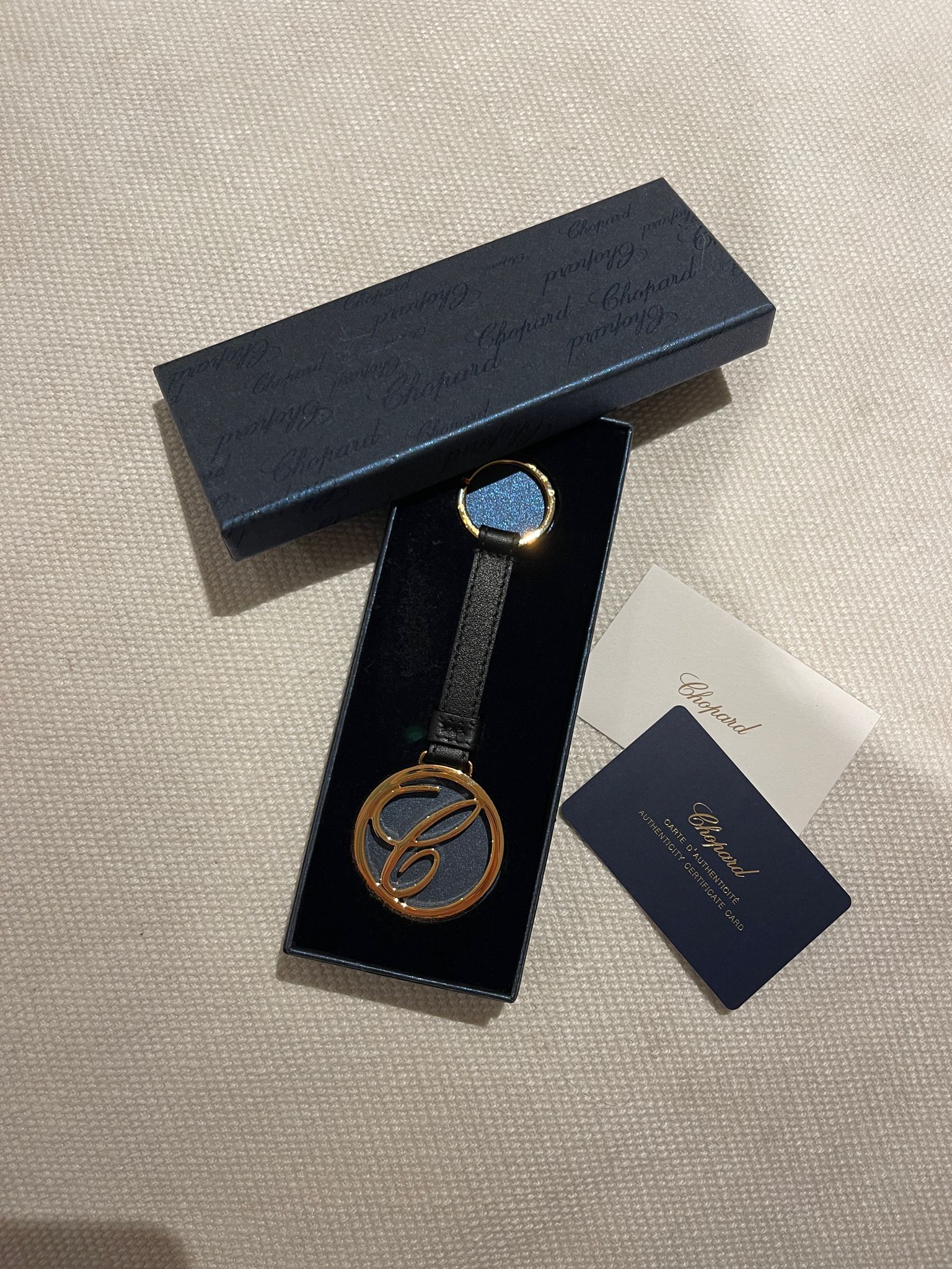 Chopard Porte Cles Gold Tone Key Ring Black leather